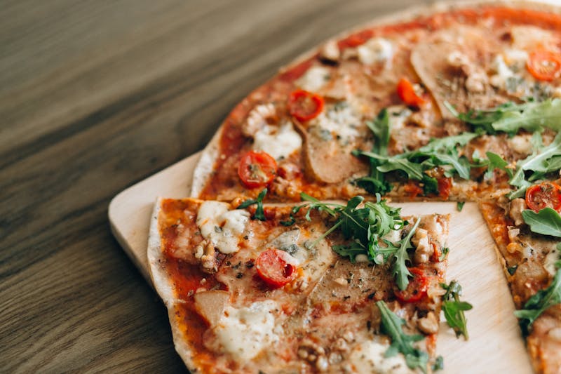 Prosciutto e Rucola coal fired pizza with arugula